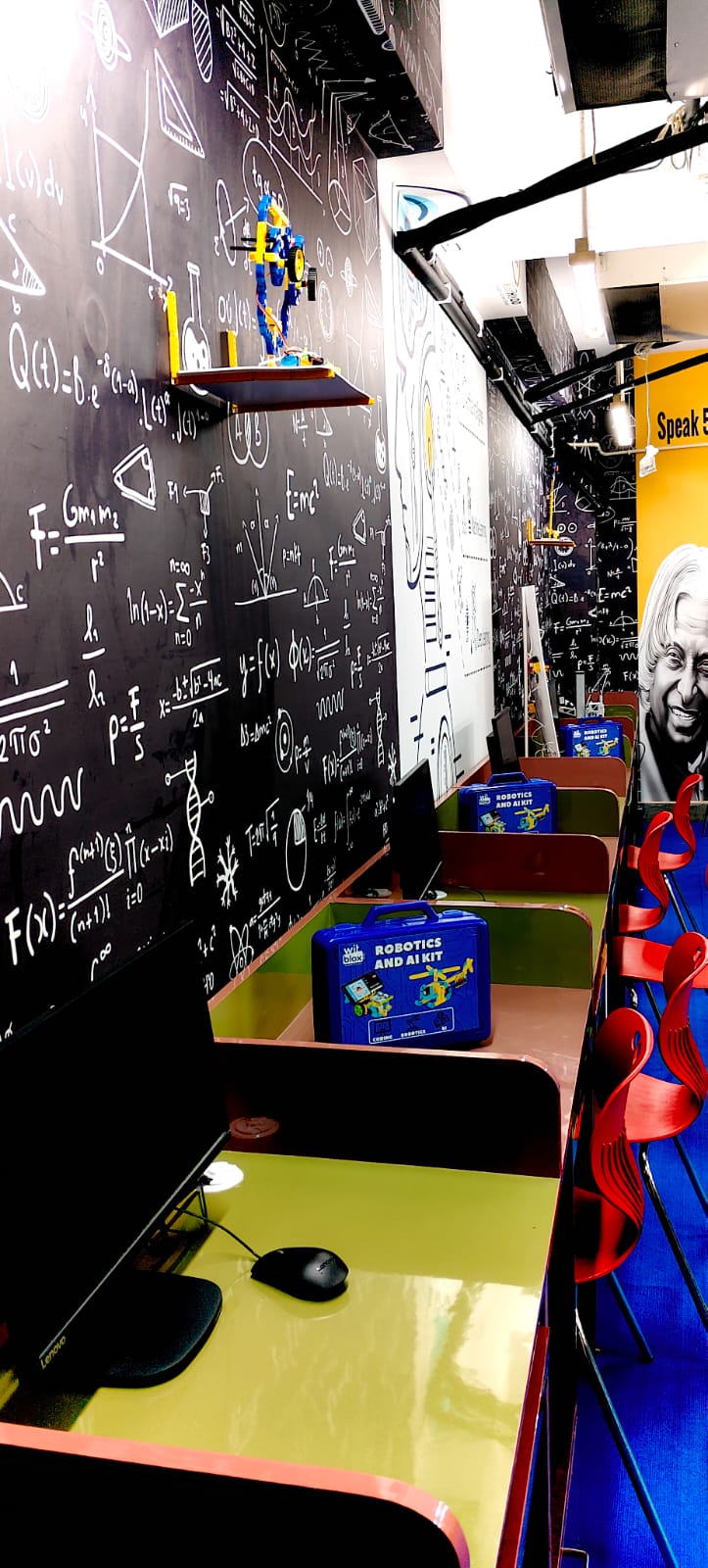 Workstations and robotics kits inside a BharatRobo lab